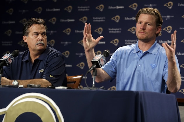 St. Louis Rams head coach Jeff Fisher, left, and general manager Les Snead hold a pre-draft news conference at the team's practice facility, Tuesday, May 6, 2014, in St. Louis. The Rams are scheduled to have two picks in the first-round of the NFL football draft on Thursday. (AP Photo/Jeff Roberson)
