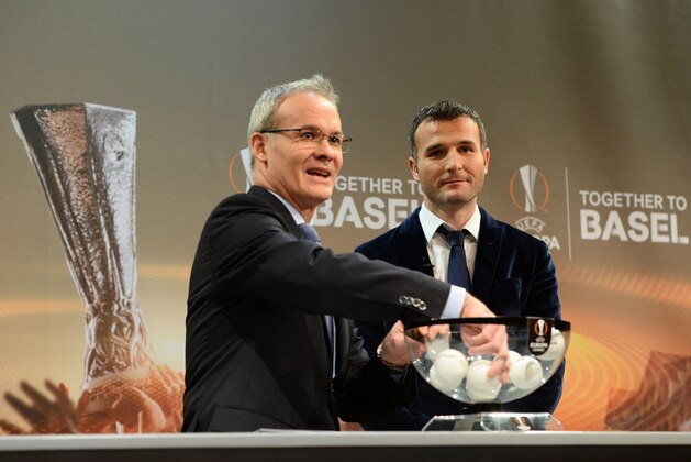 Swiss former football player Alexander Frei (R) and UEFA director of competitions Giorgio Marchetti take part in the ceremony for the quarter-final draw of the UEFA Europa League, on March 18, 2016 at the UEFA headquarters in Nyon. AFP PHOTO / JEAN-GUY PYTHON / AFP / JEAN-GUY PYTHON        (Photo credit should read JEAN-GUY PYTHON/AFP/Getty Images)