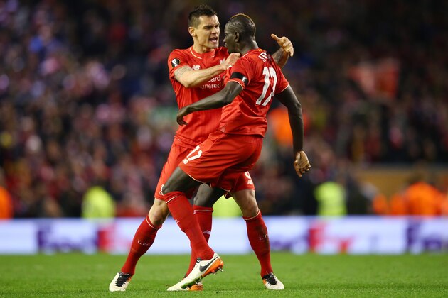 LIVERPOOL, ENGLAND - APRIL 14: Mamadou Sakho of Liverpool celebrates scoring his team's third goal with Dejan Lovren during the UEFA Europa League quarter final, second leg match between Liverpool and Borussia Dortmund at Anfield on April 14, 2016 in Liverpool, United Kingdom. (Photo by Clive Brunskill/Getty Images) LIVERPOOL, ENGLAND - APRIL 14: Mamadou Sakho of Liverpool celebrates scoring his team's third goal with Dejan Lovren during the UEFA Europa League quarter final, second leg match between Liverpool and Borussia Dortmund at Anfield on April 14, 2016 in Liverpool, United Kingdom. (Photo by Clive Brunskill/Getty Images)