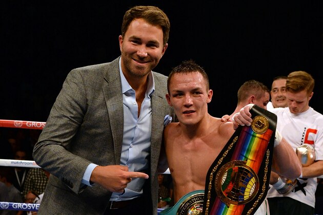 LEEDS, ENGLAND - SEPTEMBER 05:  Josh Warrington (R) celebrates with promoter Eddie Hearn after beating Joel Brunker during their Commonwealth and WBC International Featherweight title boxing contest at First Direct Arena on September 5, 2015 in Leeds, England.  (Photo by Nigel Roddis/Getty Images)