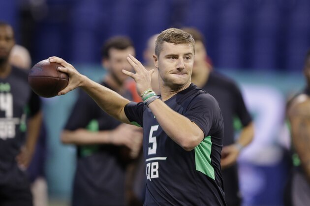 Michigan State quarterback Connor Cook runs a drill at the NFL football scouting combine on Saturday, Feb. 27, 2016, in Indianapolis. (AP Photo/Darron Cummings)