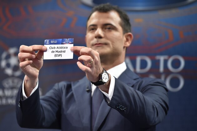 Former Serbian midfielder Dejan Stankovic shows the name of Atletico Madrid during the semi-final draw for the UEFA Champions League at the UEFA headquarters in Nyon on April 15, 2016.   AFP PHOTO / FABRICE COFFRINI / AFP / FABRICE COFFRINI        (Photo credit should read FABRICE COFFRINI/AFP/Getty Images)