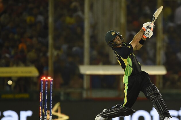 Australia's Glenn Maxwell is bowled during the World T20 cricket tournament match between India and Australia at The Punjab Cricket Stadium Association Stadium in Mohali on March 27, 2016. / AFP / MONEY SHARMA        (Photo credit should read MONEY SHARMA/AFP/Getty Images)