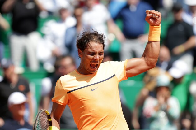 Spain's Rafael Nadal celebrates after defeating Switzerland's Stan Wawrinka in their tennis match at the Monte-Carlo ATP Masters Series tournament , on April 15, 2016 in Monaco. AFP PHOTO / JEAN-CHRISTOPHE MAGNENET / AFP / JEAN CHRISTOPHE MAGNENET        (Photo credit should read JEAN CHRISTOPHE MAGNENET/AFP/Getty Images)