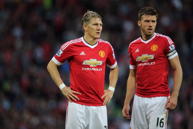 MANCHESTER, ENGLAND - SEPTEMBER 12:  Bastian Schweinsteiger and Michael Carrick of Manchester United during the Barclays Premier League match between Manchester United and Liverpool on September 12, 2015 in Manchester, United Kingdom.  (Photo by Matthew Ashton - AMA/Getty Images)
