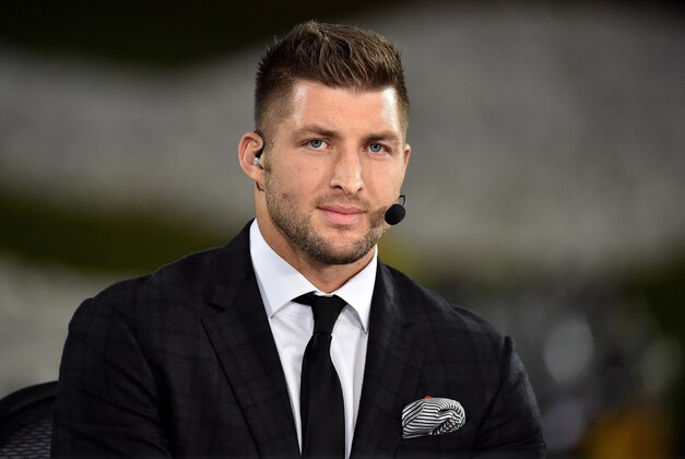 Nov 5, 2015; Columbia, MO, USA; EPSN analyst Tim Tebow looks on prior to the game between the Missouri Tigers and the Mississippi State Bulldogs at Faurot Field. Mandatory Credit: Jasen Vinlove-USA TODAY Sports