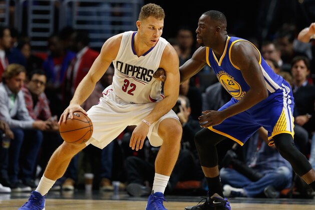 LOS ANGELES, CA - NOVEMBER 19: Blake Griffin #32 of the Los Angeles Clippers dribbles against Draymond Green #23 of the Golden State Warriors during a game at Staples Center on November 19, 2015 in Los Angeles, California. NOTE TO USER: User expressly acknowledges and agrees that, by downloading and or using this photograph, User is consenting to the terms and conditions of the Getty Images License Agreement. (Photo by Sean M. Haffey/Getty Images)
