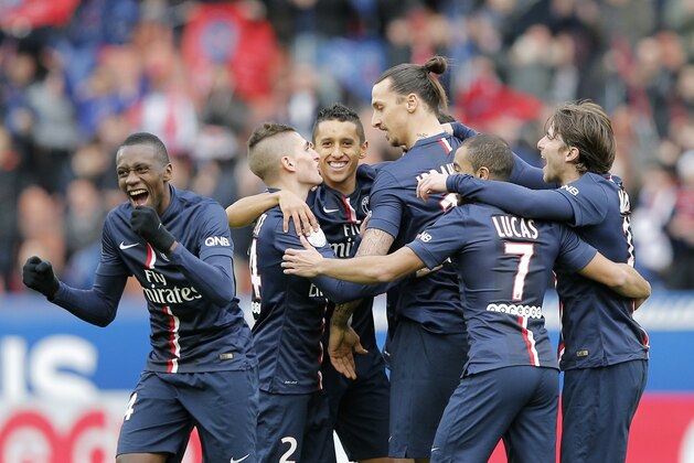 Paris St. Germain players celebrates a goal during the French league one soccer match between PSG and Caen, in Paris, France, Saturday, Feb. 14, 2015. (AP Photo/Christophe Ena) Paris St. Germain players celebrates a goal during the French league one soccer match between PSG and Caen, in Paris, France, Saturday, Feb. 14, 2015. (AP Photo/Christophe Ena)