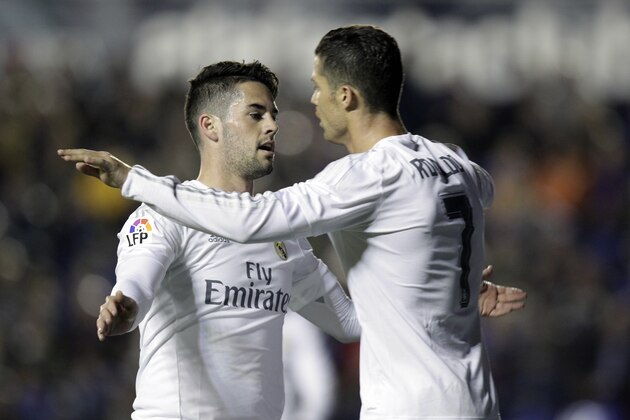 Real Madrid's Isco, left and Cristiano Ronaldo celebrate after scoring, during the Spanish La Liga soccer match between Real Madrid and Levante at the Ciutat de Valencia stadium in Valencia, Spain, Wednesday, March 2, 2016. (AP Photo/Alberto Saiz)