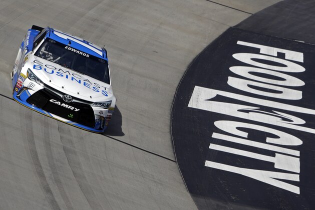 Carl Edwards makes his way around the tack during practice for a NASCAR Sprint Cup auto race, Friday, April 15, 2016 in Bristol, Tenn. Edwards won the pole for Sunday's race.(AP Photo/Wade Payne)