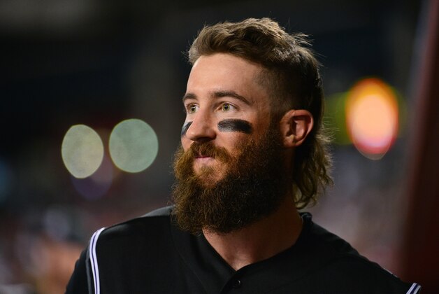 Apr 5, 2016; Phoenix, AZ, USA; Colorado Rockies center fielder Charlie Blackmon (19) watches the game against the Arizona Diamondbacks from the dugout at Chase Field. Mandatory Credit: Jennifer Stewart-USA TODAY Sports