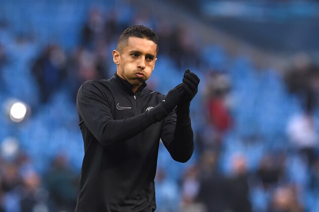 Paris Saint-Germain's Brazilian defender Marquinhos warms up before the UEFA Champions league quarter-final second leg football match between Manchester City and Paris Saint-Germain at the Etihad stadium in Manchester on April 12, 2016. / AFP / PAUL ELLIS        (Photo credit should read PAUL ELLIS/AFP/Getty Images)