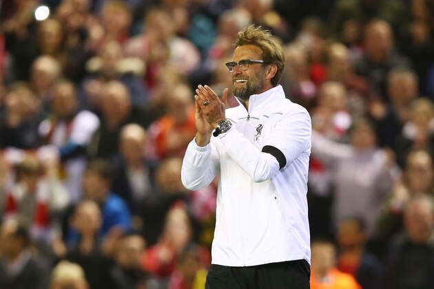 LIVERPOOL, ENGLAND - APRIL 14:  Jurgen Klopp, manager of Liverpool celebrates victory after the UEFA Europa League quarter final, second leg match between Liverpool and Borussia Dortmund at Anfield on April 14, 2016 in Liverpool, United Kingdom.  (Photo by Clive Brunskill/Getty Images)