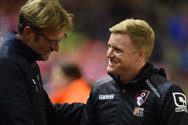 Liverpool's German manager Jurgen Klopp (L) shakes hands with Bournemouth's English manager Eddie Howe ahead of the English League Cup fourth round football match between Liverpool and Bournemouth at Anfield stadium in Liverpool, north west England on October 28, 2015. AFP PHOTO / PAUL ELLIS

RESTRICTED TO EDITORIAL USE. NO USE WITH UNAUTHORIZED AUDIO, VIDEO, DATA, FIXTURE LISTS, CLUB/LEAGUE LOGOS OR 'LIVE' SERVICES. ONLINE IN-MATCH USE LIMITED TO 75 IMAGES, NO VIDEO EMULATION. NO USE IN BETTING, GAMES OR SINGLE CLUB/LEAGUE/PLAYER PUBLICATIONS.        (Photo credit should read PAUL ELLIS/AFP/Getty Images)