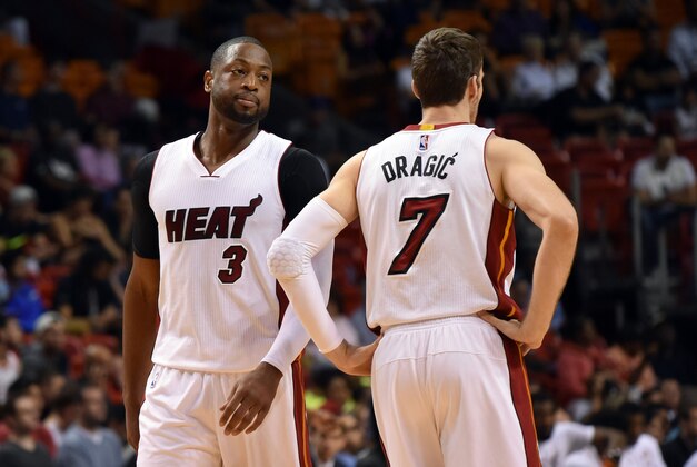 Apr 10, 2016; Miami, FL, USA; Miami Heat guard Dwyane Wade (left) talks with guard Goran Dragic (right) during the first half against the Orlando Magic at American Airlines Arena. Mandatory Credit: Steve Mitchell-USA TODAY Sports Apr 10, 2016; Miami, FL, USA; Miami Heat guard Dwyane Wade (left) talks with guard Goran Dragic (right) during the first half against the Orlando Magic at American Airlines Arena. Mandatory Credit: Steve Mitchell-USA TODAY Sports