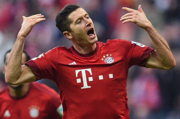 Bayern Munich's Polish striker Robert Lewandowski celebrates scoring during the German first division Bundesliga football match FC Bayern Munich vs Schalke 04 in Munich, southern Germany, on April 16, 2016. / AFP / CHRISTOF STACHE / RESTRICTIONS: DURING MATCH TIME: DFL RULES TO LIMIT THE ONLINE USAGE TO 15 PICTURES PER MATCH AND FORBID IMAGE SEQUENCES TO SIMULATE VIDEO. == RESTRICTED TO EDITORIAL USE == FOR FURTHER QUERIES PLEASE CONTACT DFL DIRECTLY AT + 49 69 650050
        (Photo credit should read CHRISTOF STACHE/AFP/Getty Images)