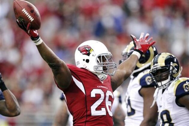 Arizona Cardinals running back Beanie Wells (26) celebrates his touchdown against the St. Louis Rams during the first half of an NFL football game, Sunday, Nov. 25, 2012, in Glendale, Ariz. (AP Photo/Paul Connors)