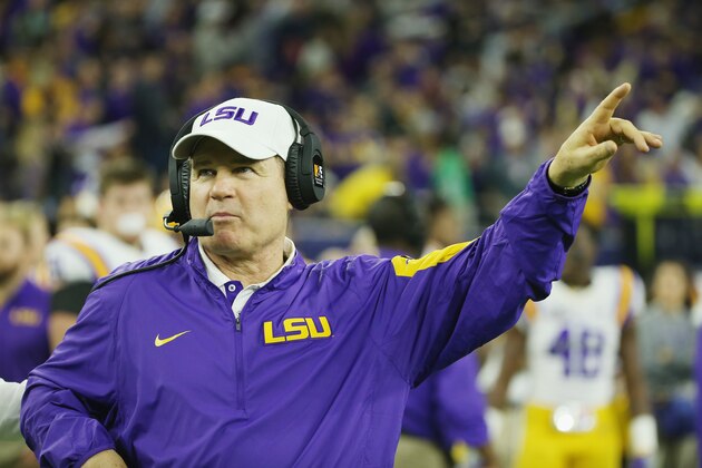 HOUSTON, TX - DECEMBER 29:  Head coach Les Miles of the LSU Tigers waits near the bench area before the start of their game against the Texas Tech Red Raiders during the AdvoCare V100 Texas Bowl at NRG Stadium on December 29, 2015 in Houston, Texas.  (Photo by Scott Halleran/Getty Images)