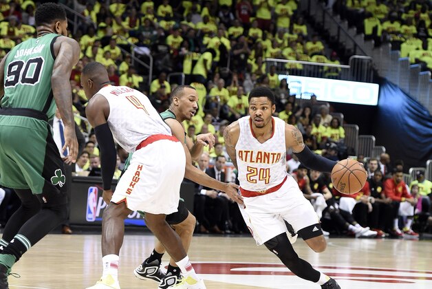 Apr 16, 2016; Atlanta, GA, USA; Atlanta Hawks forward Kent Bazemore (24) drives to the basket against the Boston Celtics during the first half in game one of the first round of the NBA Playoffs at Philips Arena. Mandatory Credit: John David Mercer-USA TODAY Sports