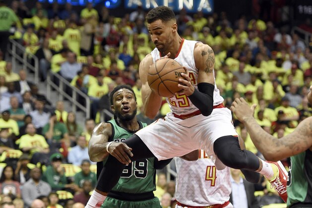 Apr 16, 2016; Atlanta, GA, USA; Atlanta Hawks forward Thabo Sefolosha (25) pulls down a rebound against the Boston Celtics during the first half in game one of the first round of the NBA Playoffs at Philips Arena. Mandatory Credit: John David Mercer-USA TODAY Sports