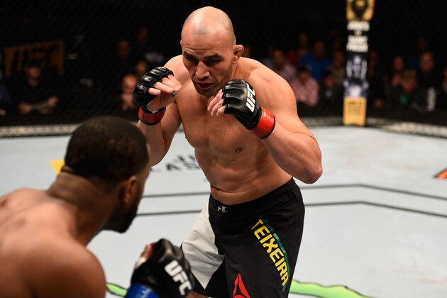 TAMPA, FL - APRIL 16:   (R-L) Glover Teixeira circles Rashad Evans in their light heavyweight bout during the UFC Fight Night event at Amalie Arena on April 16, 2016 in Tampa, Florida. (Photo by Jeff Bottari/Zuffa LLC/Zuffa LLC via Getty Images)