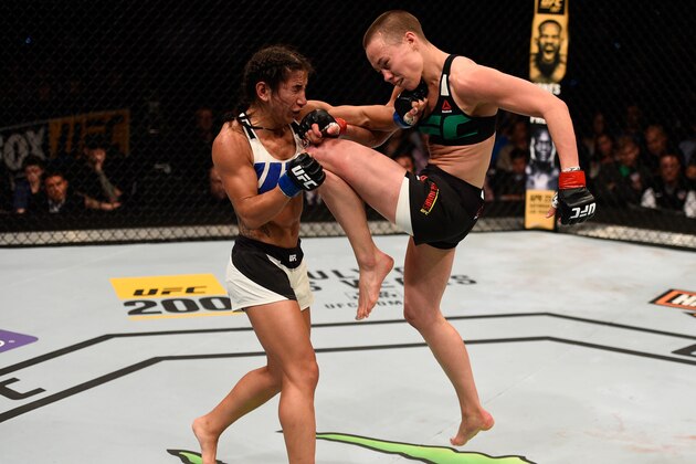 TAMPA, FL - APRIL 16:  (R-L) Rose Namajunas knees Tecia Torres in their women's strawweight bout during the UFC Fight Night event at Amalie Arena on April 16, 2016 in Tampa, Florida. (Photo by Jeff Bottari/Zuffa LLC/Zuffa LLC via Getty Images)