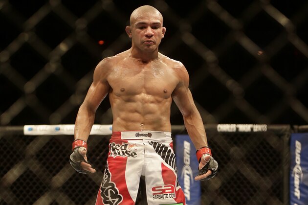 Diego Brandao, top, from Brazil, fights Joey Gambino, from the U.S., during their featherweight mixed martial arts bout at the Ultimate Fighting Championship (UFC) 153 in Rio de Janeiro, Brazil, Saturday Oct.  13, 2012. Brandao defeated Gambino. (AP Photo/Felipe Dana)