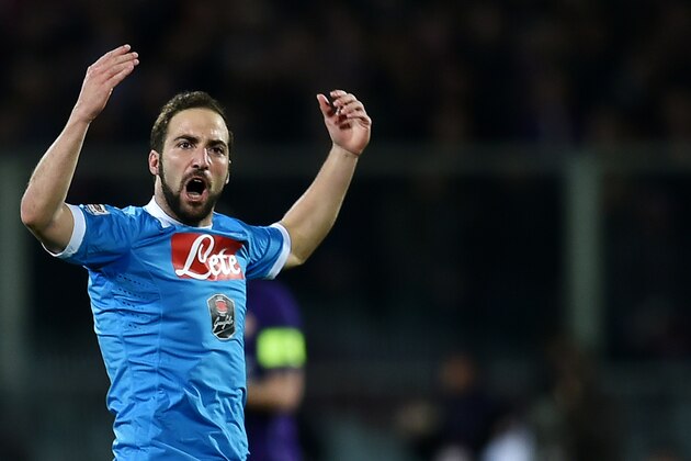 Napoli's Argentinian forward Gonzalo Higuain  celebrates after scoring a goal during the Italian Serie A football match between Fiorentina and Napoli on February 29, 2016, at the Artemio Franchi stadium in Florence. / AFP / ALBERTO PIZZOLI        (Photo credit should read ALBERTO PIZZOLI/AFP/Getty Images)