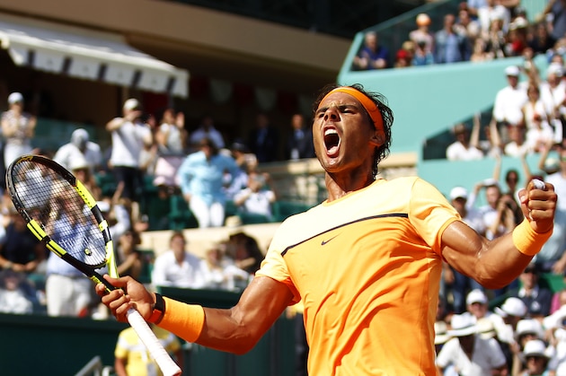 Spain's Rafael Nadal celebrates after winning the match against Britain's Andy Murray during the Monte-Carlo ATP Masters Series Tournament semi-final tennis match, on April 16, 2016 in Monaco. Nadal won the match 2-6, 6-4, 6-2.  AFP PHOTO / JEAN CHRISTOPHE MAGNENET / AFP / JEAN CHRISTOPHE MAGNENET        (Photo credit should read JEAN CHRISTOPHE MAGNENET/AFP/Getty Images)