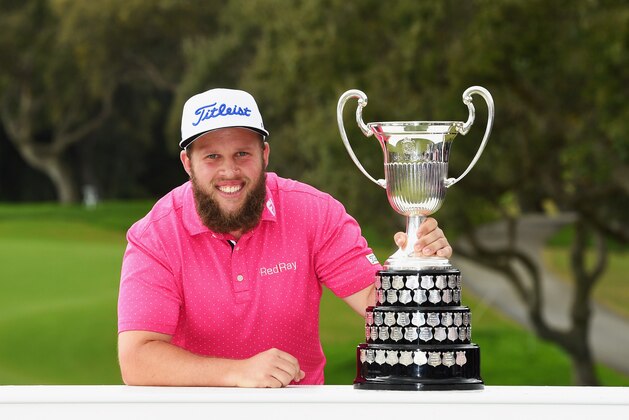 SOTOGRANDE, SPAIN - APRIL 17:  Andrew Johnston of England poses with the trophy after victory during the final round on day four of the Open de Espana at Real Club Valderrama on April 17, 2016 in Sotogrande, Spain.  (Photo by Ross Kinnaird/Getty Images)