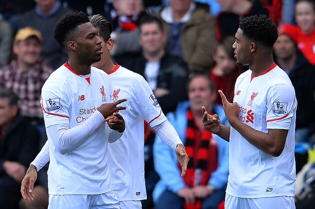 Liverpool's English striker Daniel Sturridge (L) celebrates scoring his team's second goal with Liverpool's English midfielder Jordon Ibe during the English Premier League football match between Bournemouth and Liverpool at the Vitality Stadium in Bournemouth, southern England on April 17, 2016. / AFP / GLYN KIRK / RESTRICTED TO EDITORIAL USE. No use with unauthorized audio, video, data, fixture lists, club/league logos or 'live' services. Online in-match use limited to 75 images, no video emulation. No use in betting, games or single club/league/player publications.  /         (Photo credit should read GLYN KIRK/AFP/Getty Images)
