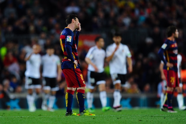 BARCELONA, SPAIN - APRIL 17:  Lionel Messi of FC Barcelona looks on dejected after his team mate Ivan Rakitic of FC Barcelona scored an own goal during the La Liga match between FC Barcelona and Valencia CF at Camp Nou on April 17, 2016 in Barcelona, Spain.  (Photo by David Ramos/Getty Images)