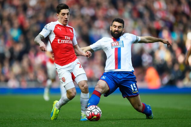LONDON, ENGLAND - APRIL 17:  Hector Bellerin of Arsenal is tackled by Mile Jedinak of Crystal Palace during the Barclays Premier League match between Arsenal and Crystal Palace at the Emirates Stadium on April 17, 2016 in London, England.  (Photo by Mike Hewitt/Getty Images)