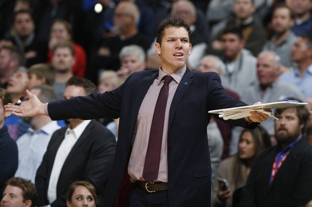 Golden State Warriors interim coach Luke Walton calls for a time out with only 2.8 seconds remaining against he Denver Nuggets in the second half of an NBA basketball game, Wednesday, Jan. 13, 2016, in Denver. The Nuggets won 112-110. (AP Photo/David Zalubowski)