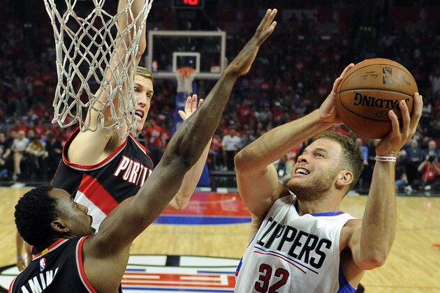 LOS ANGELES, CA - APRIL 17: Blake Griffin #32 of the Los Angeles Clippers goes for a layup against Al-Farouq Aminu #8 and Mason Plumlee #24 of the Portland Trail Blazers during the first half in Game One of the Western Conference Quarterfinals during the 2016 NBA Playoffs at Staples Center April 17, 2016, in Los Angeles, California. NOTE TO USER: User expressly acknowledges and agrees that, by downloading and or using the photograph, User is consenting to the terms and conditions of the Getty Images License Agreement. (Photo by Kevork Djansezian/Getty Images)