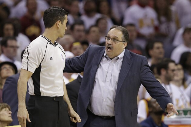 Detroit Pistons' head coach Stan Van Gundy, right, argues with official Zach Zarba in the second half in Game 1 of a first-round NBA basketball playoff series, Sunday, April 17, 2016, in Cleveland.  (AP Photo/Tony Dejak)