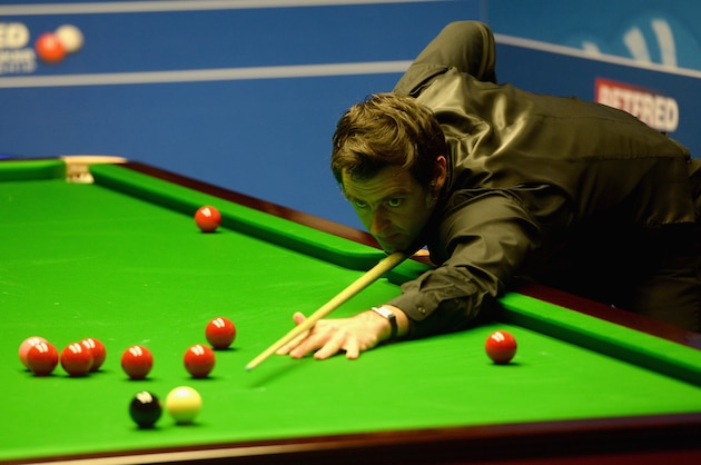 SHEFFIELD, ENGLAND - APRIL 17:  Ronnie O'Sullivan plays a shot against David Gilbert during their first round match of the 2016 Betfred World Snooker Championship at Crucible Theatre on April 17, 2016 in Sheffield, England.  (Photo by Gareth Copley/Getty Images)
