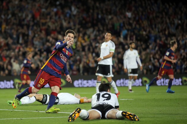 FC Barcelona's Lionel Messi reacts after scoring against Valencia during a Spanish La Liga soccer match between FC Barcelona and Valencia at the Camp Nou stadium in Barcelona, Spain, Sunday, April 17, 2016. (AP Photo/Manu Fernandez)