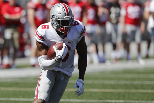 Ohio State wide receiver Torrance Gibson plays in Ohio State's NCAA college football spring game Saturday, April 16, 2016, in Columbus, Ohio. (AP Photo/Jay LaPrete)
