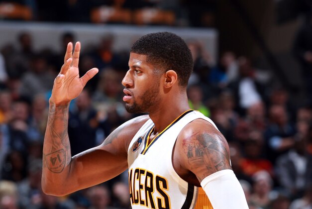 Apr 6, 2016; Indianapolis, IN, USA; Indiana Pacers forward Paul George (13) reacts to scoring against the Cleveland Cavaliers during the second half at Bankers Life Fieldhouse. Indiana defeats Cleveland 123-109. Mandatory Credit: Brian Spurlock-USA TODAY Sports