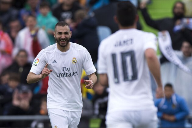 GETAFE, SPAIN - APRIL 16:  Karim Benzema (L) of Real Madrid CF celebrates scoring their opening goal with teammate James Rodriguez (R) during the La Liga match between Getafe CF and Real Madrid CF at Coliseum Alfonso Perez on April 16, 2016 in Getafe, Spain.  (Photo by Gonzalo Arroyo Moreno/Getty Images)