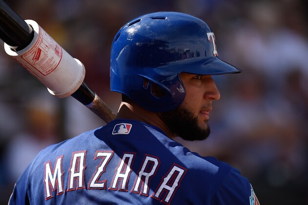 SURPRISE, AZ - MARCH 03:  Nomar Mazara #30 of the Texas Rangers waits on deck against the Kansas City Royals at Surprise Stadium on March 3, 2016 in Surprise, Arizona.  (Photo by Lisa Blumenfeld/Getty Images)