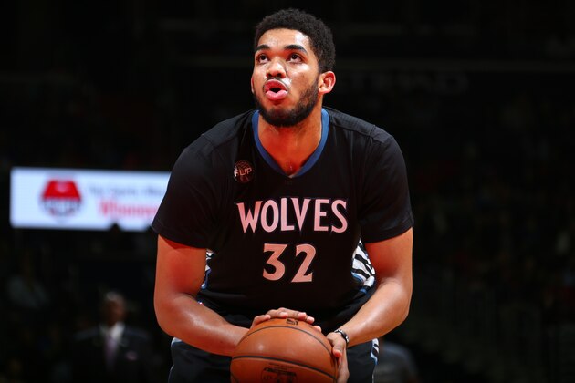 WASHINGTON, DC -  MARCH 25: Karl-Anthony Towns #32 of the Minnesota Timberwolves shoots a free throw against the Washington Wizards on March 25, 2016 at Verizon Center in Washington, DC. NOTE TO USER: User expressly acknowledges and agrees that, by downloading and or using this Photograph, user is consenting to the terms and conditions of the Getty Images License Agreement. Mandatory Copyright Notice: Copyright 2016 NBAE (Photo by Ned Dishman/NBAE via Getty Images)