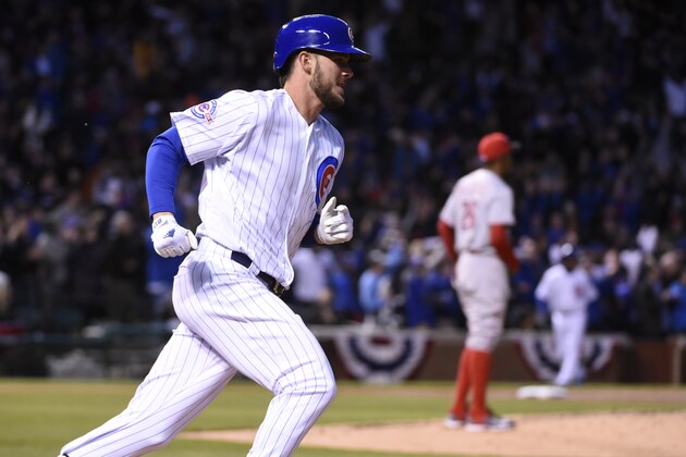 CHICAGO, IL - APRIL 14: Kris Bryant #17 of the Chicago Cubs runs the bases after hitting a home run against the Cincinnati Reds during the second inning on April 14, 2016 at Wrigley Field in Chicago, Illinois. (Photo by David Banks/Getty Images)
