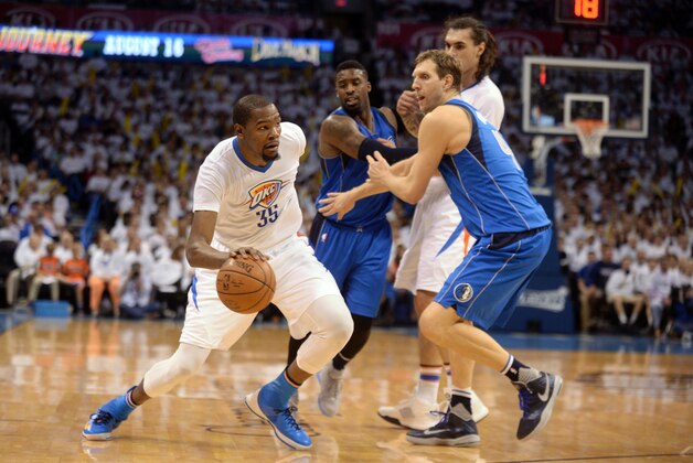 Apr 18, 2016; Oklahoma City, OK, USA; Oklahoma City Thunder forward Kevin Durant (35) drives to the basket in front of Dallas Mavericks forward Dirk Nowitzki (41) during the third quarter in game two of the first round of the NBA Playoffs at Chesapeake Energy Arena. Mandatory Credit: Mark D. Smith-USA TODAY Sports