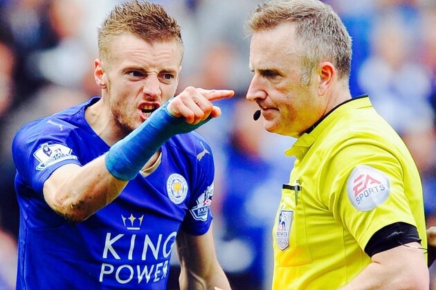 Leicester City's English striker Jamie Vardy (L) reacts after referee Jonathan Moss (2L) showed Vardy his second yellow card for simulation to send him off during the English Premier League football match between Leicester City and West Ham United at King Power Stadium in Leicester, central England on April 17, 2016. / AFP / ADRIAN DENNIS / RESTRICTED TO EDITORIAL USE. No use with unauthorized audio, video, data, fixture lists, club/league logos or 'live' services. Online in-match use limited to 75 images, no video emulation. No use in betting, games or single club/league/player publications.  /         (Photo credit should read ADRIAN DENNIS/AFP/Getty Images)