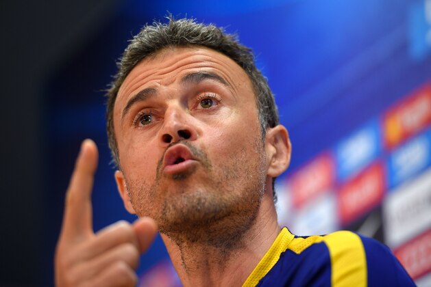 Barcelona's coach Luis Enrique speaks during a press conference at the FC Barcelona Joan Gamper Sports Center in Sant Joan Despi, near Barcelona on April 16, 2015, on the eve of the Spanish League match FC Barcelona vs Valencia CF. / AFP / LLUIS GENE        (Photo credit should read LLUIS GENE/AFP/Getty Images)