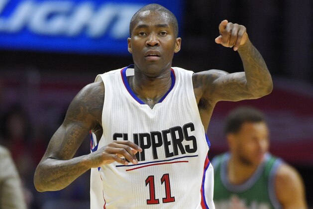 Los Angeles Clippers guard Jamal Crawford gestures after scoring during the second half of an NBA basketball game against the Dallas Mavericks, Sunday, April 10, 2016, in Los Angeles. (AP Photo/Mark J. Terrill)