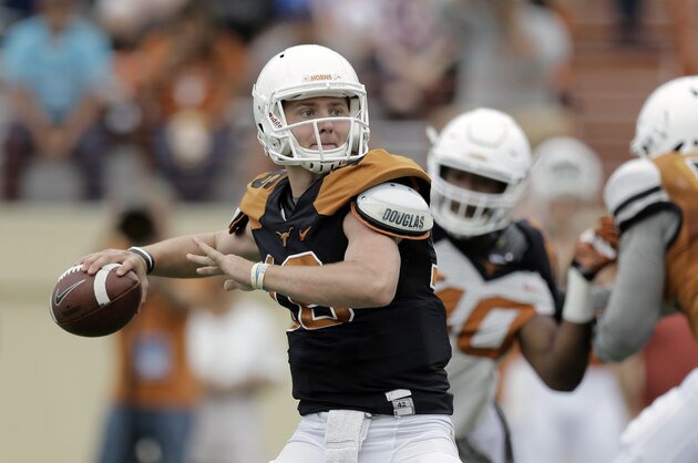Texas quarterback Shane Buechele (16) throws during a spring NCAA college football game, Saturday, April 16, 2016, in Austin, Texas. (AP Photo/Eric Gay)