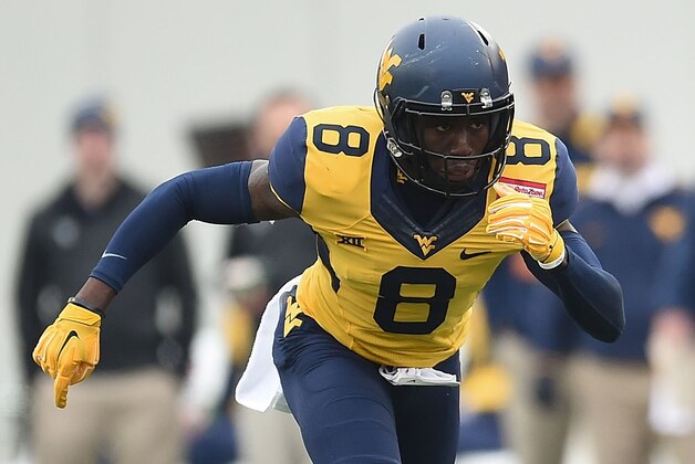 MEMPHIS, TN - DECEMBER 29:  Karl Joseph #8 of the West Virginia Mountaineers anticipates a play against the Texas A&M Aggies during the 56th annual Autozone Liberty Bowl at Liberty Bowl Memorial Stadium on December 29, 2014 in Memphis, Tennessee.  Texas A&M won the game 45-37.  (Photo by Stacy Revere/Getty Images)